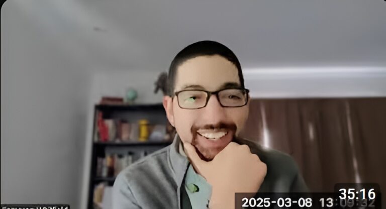 Cameron on a zoom meeting with an author